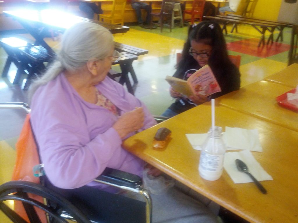 Reading to a Senior at HEB